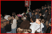 A huge crowd looks on from the Kemah Boardwalk