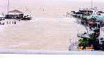 tide swollen Clear Creek West side of Kemah Boardwalk Marina (Click to Enlarge)